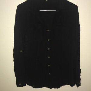 Black button down blouse. Good for business casual